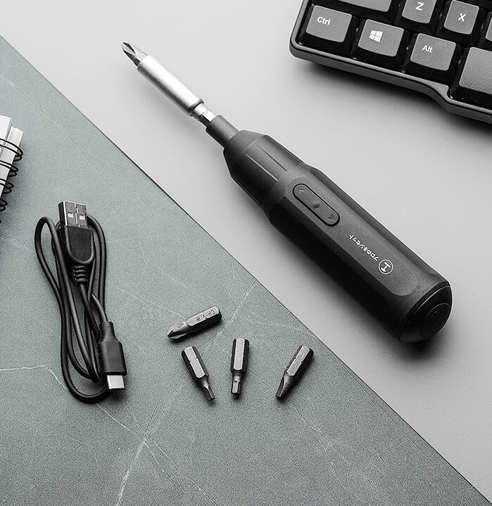 Mini portable screwdriver power tool with compact ergonomic design and interchangeable bits