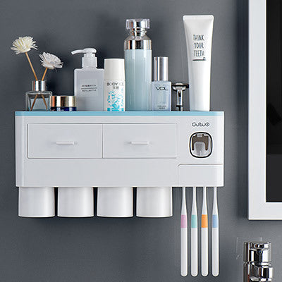 Hanging magnetic toothbrush holder with single drawer, toothpaste squeezer, and non-marking storage rack