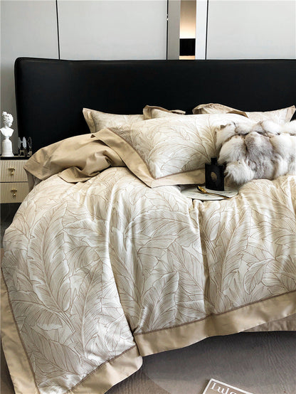 Long-staple cotton printed four-piece bedding set with coordinating duvet cover and pillowcases