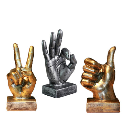 Resin gesture ornaments in assorted hand gesture designs