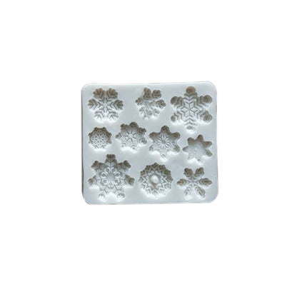 Christmas snowflake silicone mold with detailed snowflake-shaped cavities