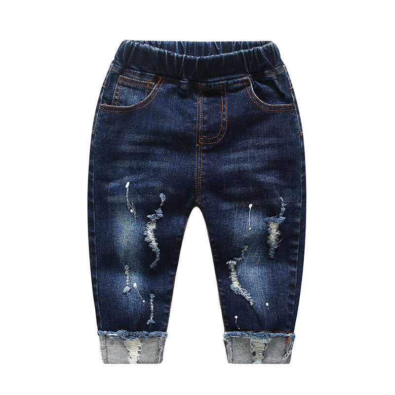 Children's boy ripped denim pants, front view velcro waist and distressed details