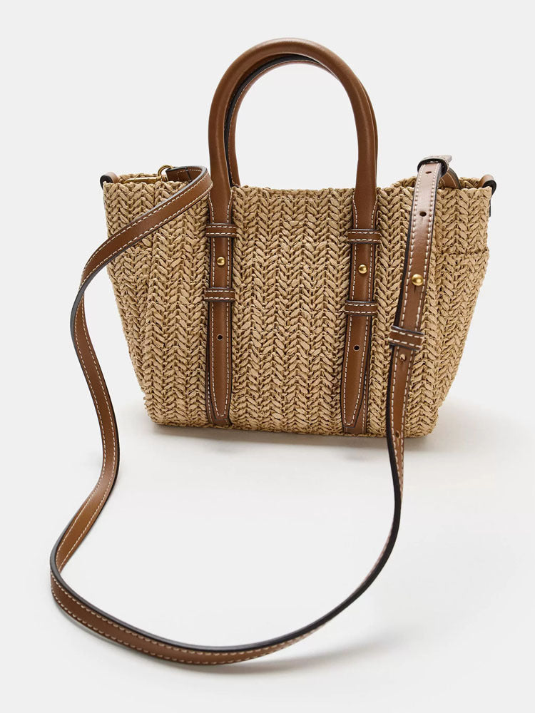 Straw woven hand-held shoulder crossbody bag with textured design and adjustable strap