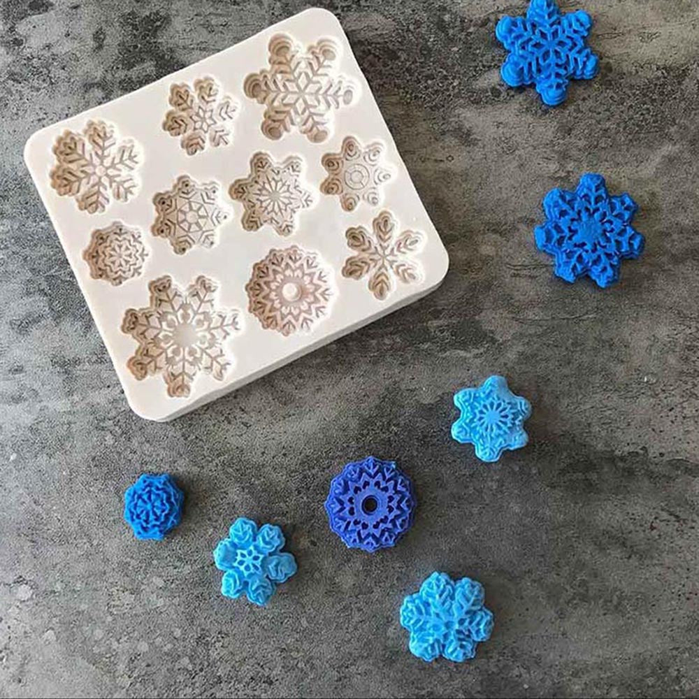 Christmas snowflake silicone mold by My Store, showing detailed snowflake-shaped cavities for festive baking and crafts