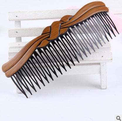 Fashion retro hair comb in a vintage-inspired design with decorative details