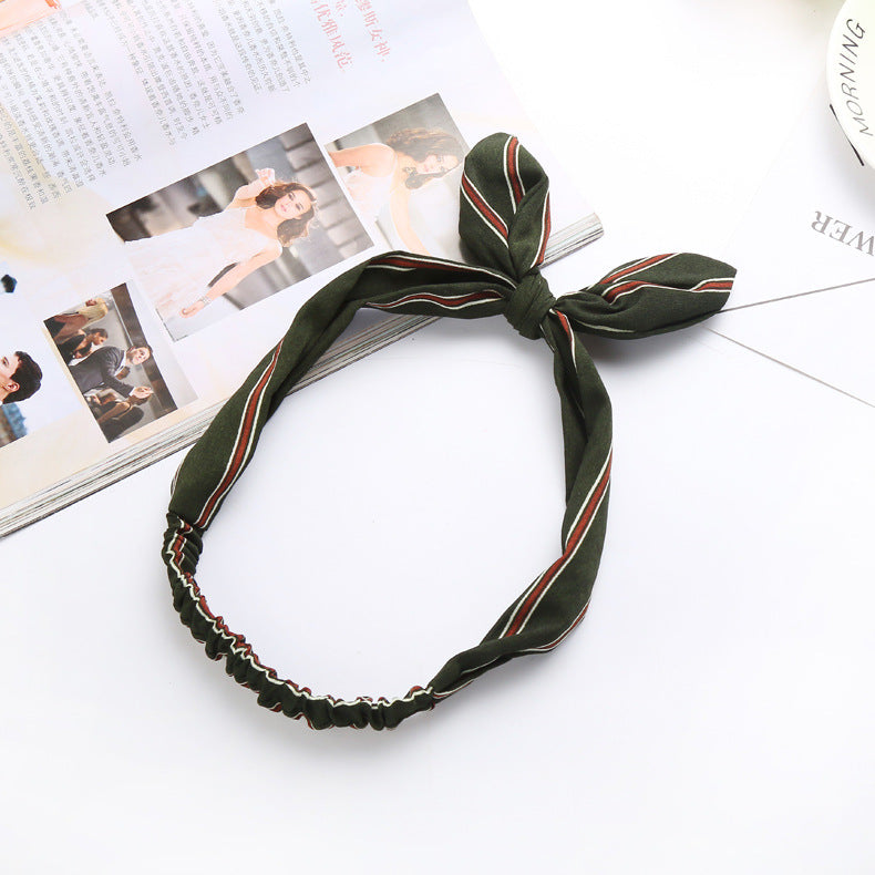 Big bow tie bunny ears headband, pink and white rabbit ear accessory with oversized bow detailing