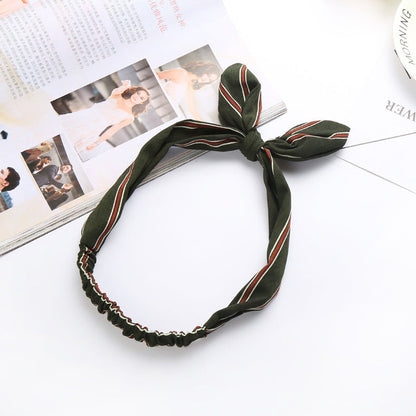Big bow tie bunny ears headband, pink and white rabbit ear accessory with oversized bow detailing