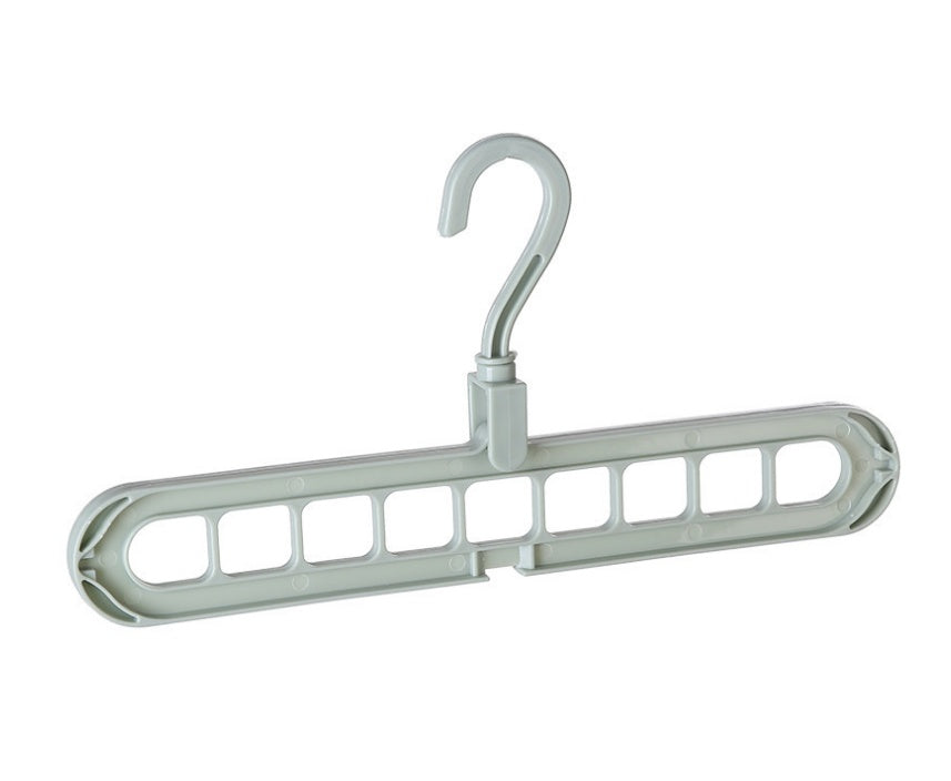 Plastic clothes hanger with storage hook for organizing garments