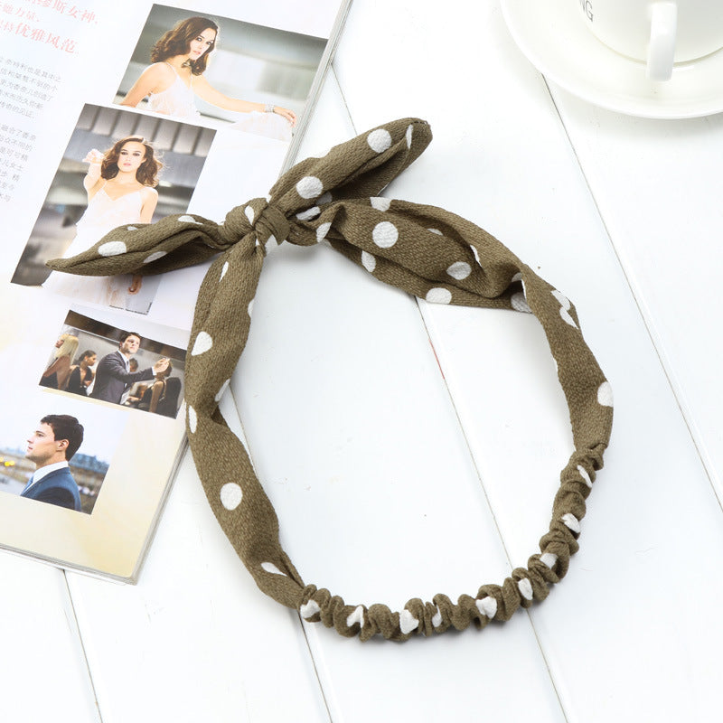 Big bow tie bunny ears headband with soft rabbit ears design, front view
