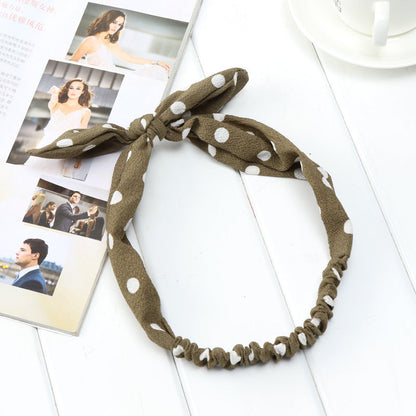 Big bow tie bunny ears headband with soft rabbit ears design, front view