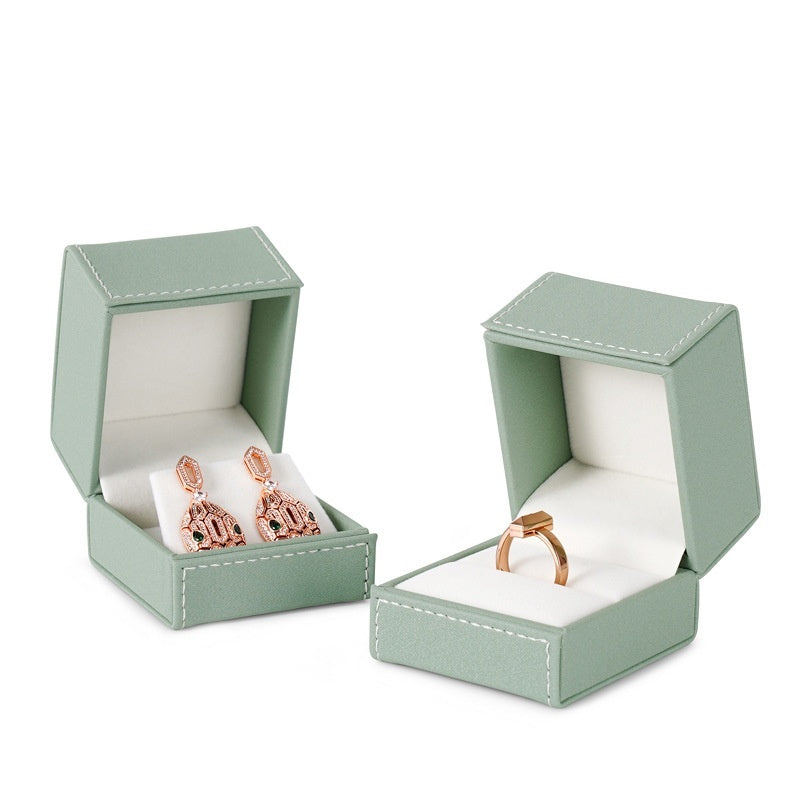 Jewellery box ring storage box with ring slots and compact hinged design