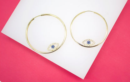 MIA Jewelry Evil Eye endless hoop earrings with micro CZ stones, silver-toned hoops with detailed eye design