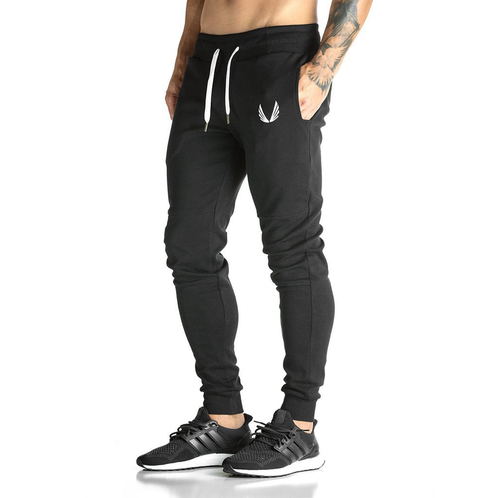 Running training pants in black by My Store, shown from the frontorage