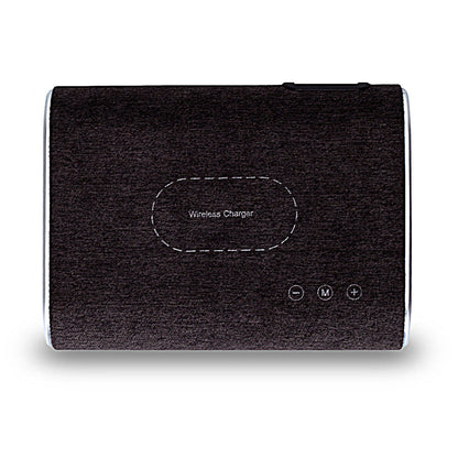 Wireless charger speaker with compact modern design and integrated charging pad