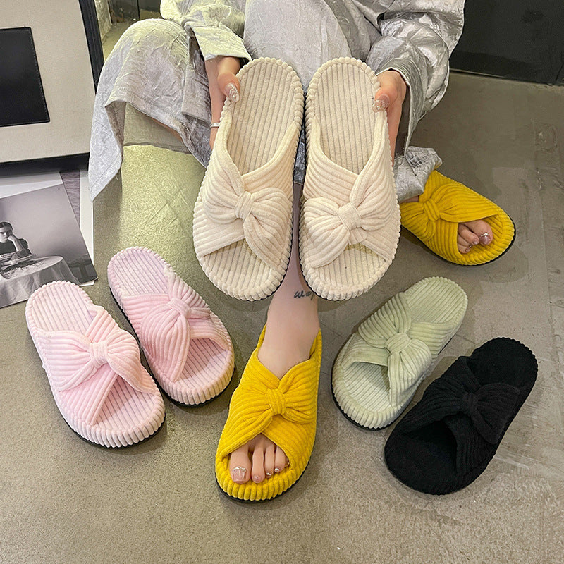 Women's cross-strap flat slide sandals in a simple open-toe design