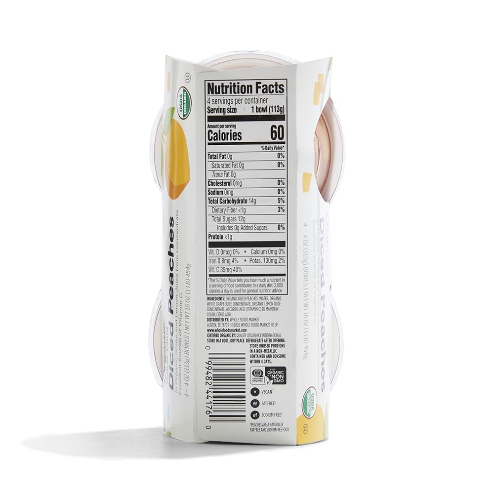 Canned organic diced peaches in 16-ounce can from 365 by Whole Foods Market, showing peach chunks in syrup