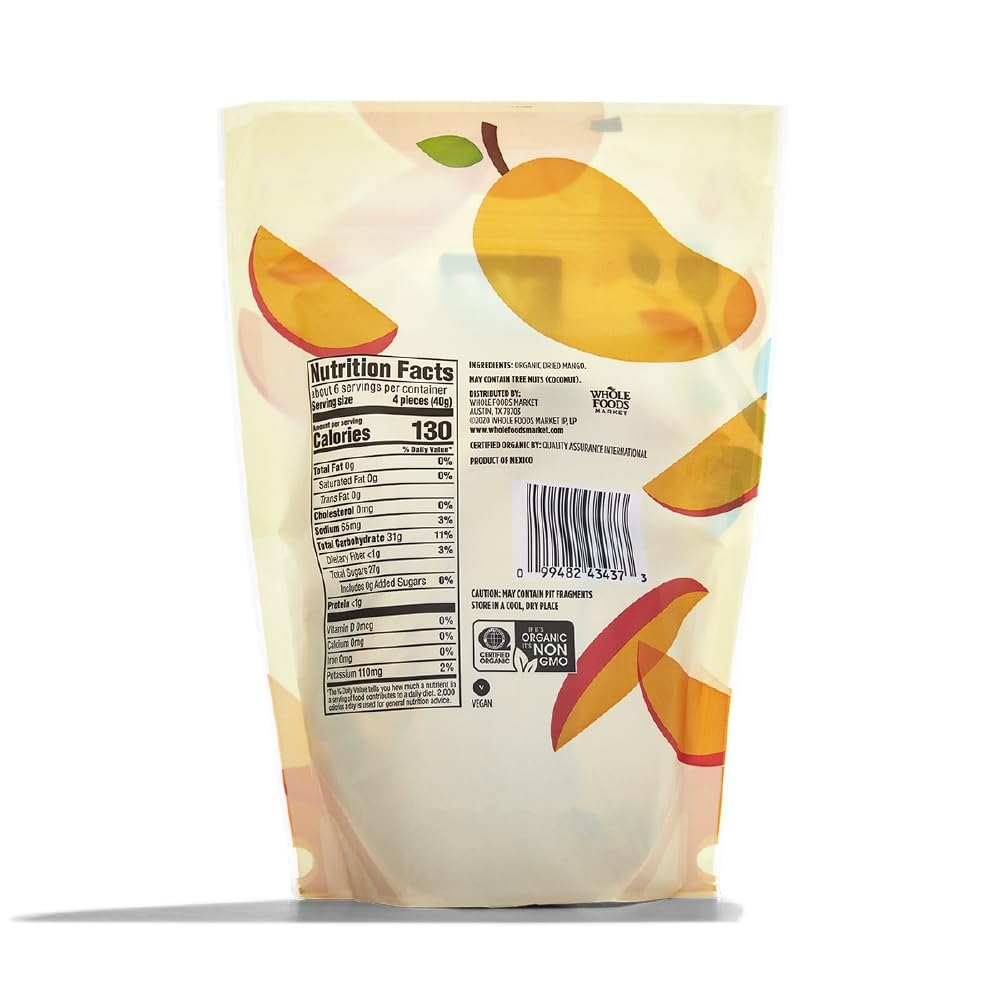 Dried organic mango slices in an 8-ounce bag from 365 by Whole Foods Market, showing vibrant orange dried fruit pieces.