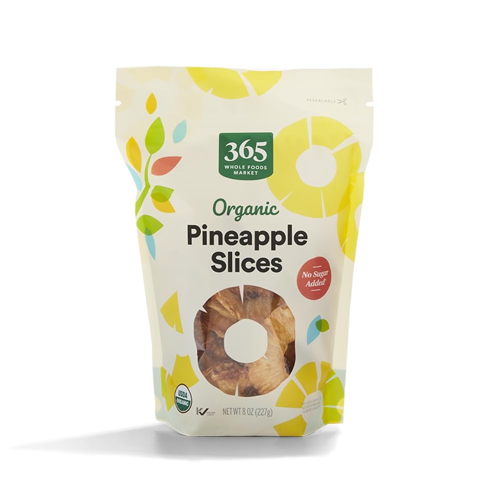 Organic dried pineapple pieces in a clear bag, 8 ounces, from 365 by Whole Foods Market, ready for snacking or baking.