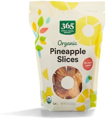 Dried organic pineapple slices in a clear bag from 365 by Whole Foods Market, 8-ounce packaging, with visible golden dried fruit.