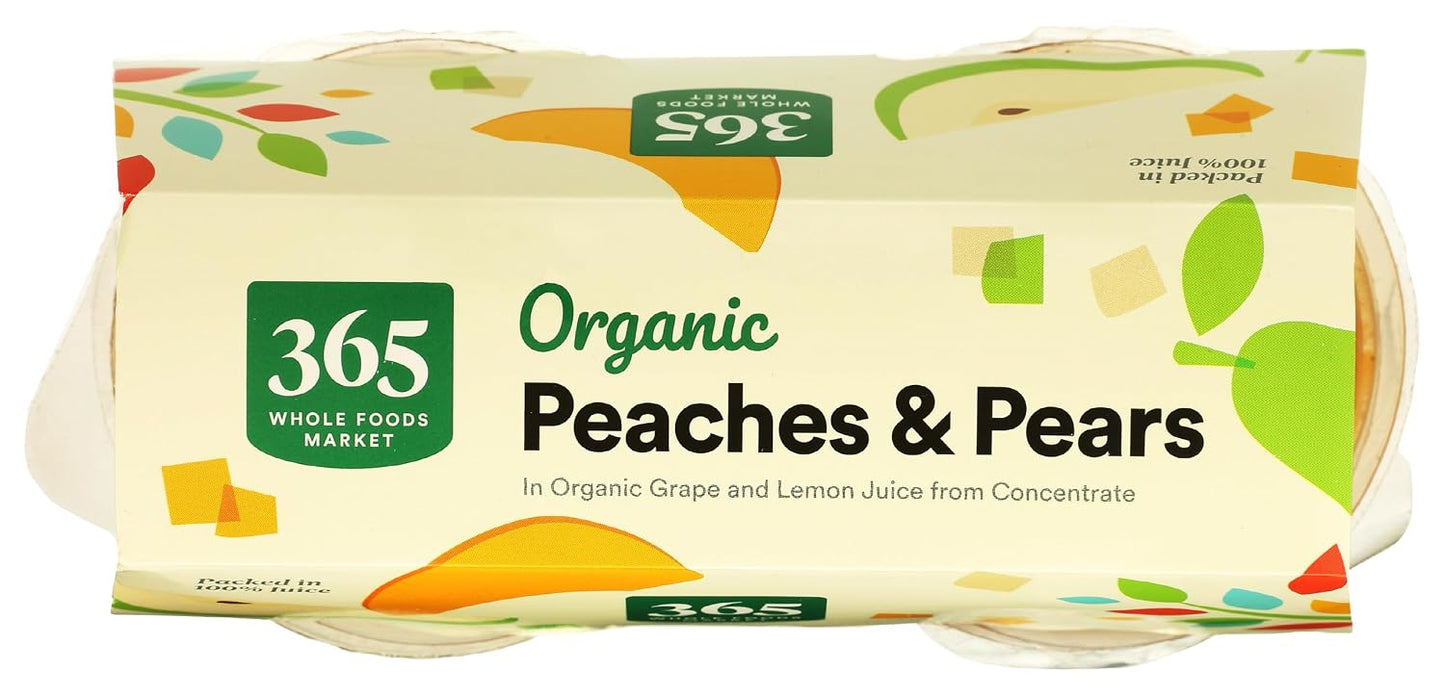 Four 365 by Whole Foods Market organic peach and pear snack cups with fresh fruit in clear plastic containers.