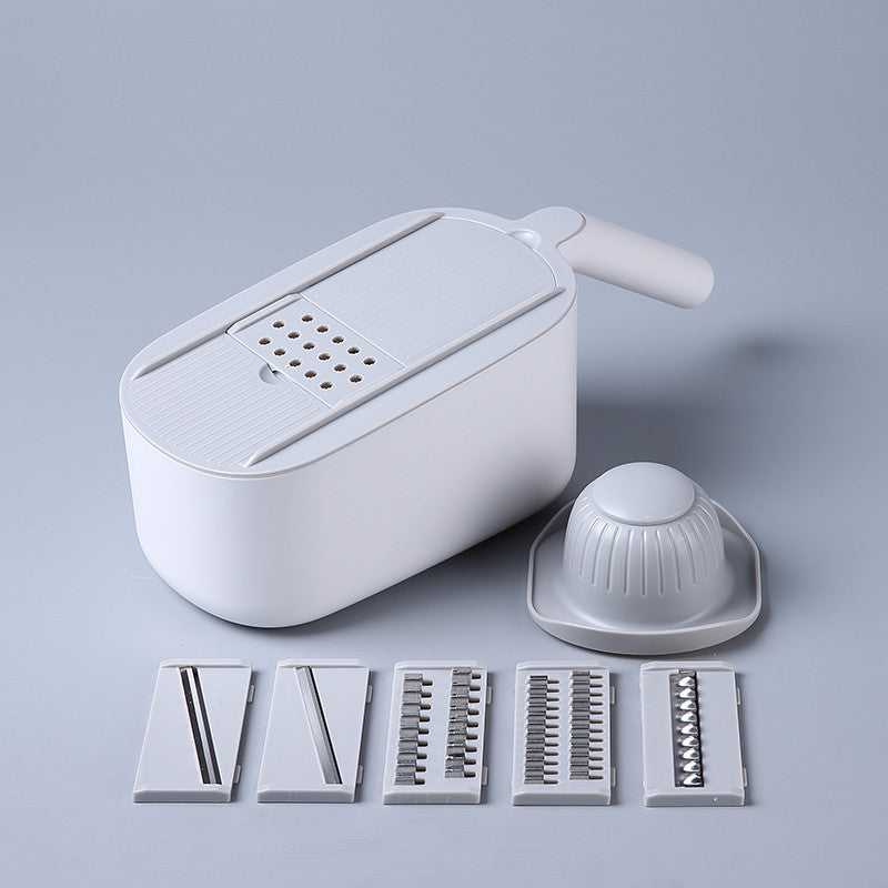 Kitchen vegetable slicer by My Store, shown in a compact handheld design