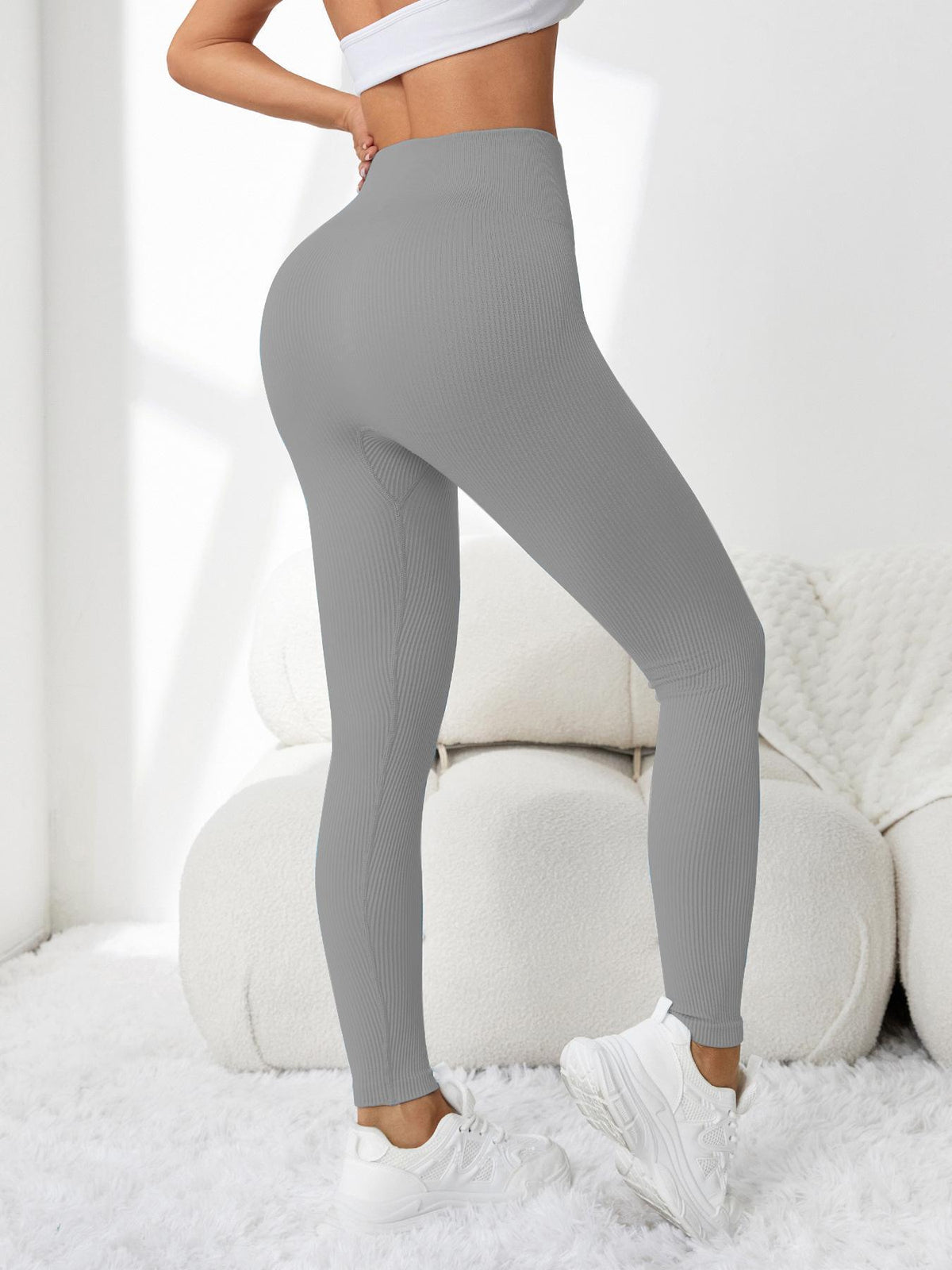 Women's high-waisted tight-fitting butt-lifting yoga pants in a sleek, sculpting design