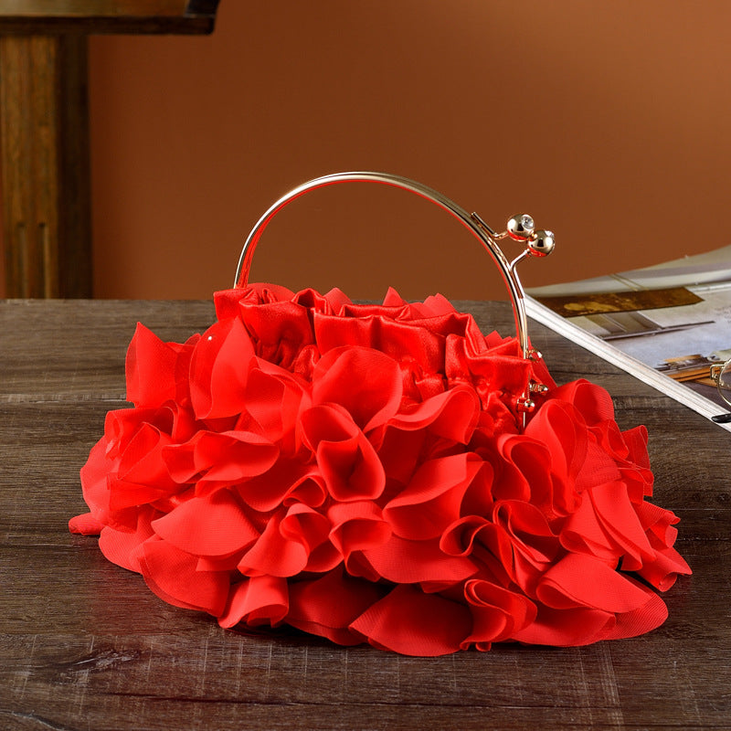 Handheld ladies' polyester banquet bag in a compact, elegant design