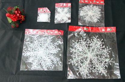 White snowflakes for Christmas decorations, festive hanging ornaments in assorted designs