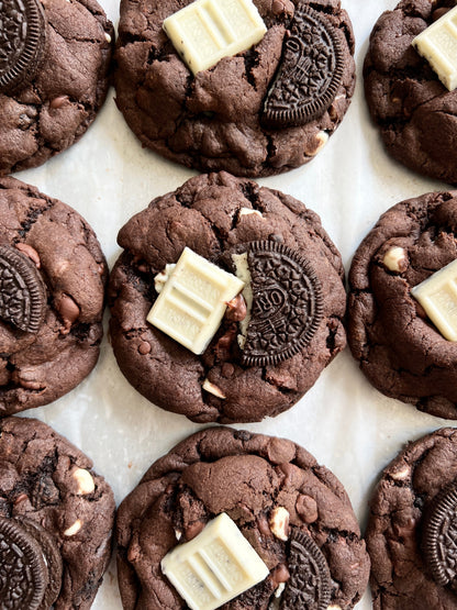 Chocolate Cookies & Cream cookies from Let's Get Baked Artisan Desserts, showing crispy cookies with chocolate and cream filling.