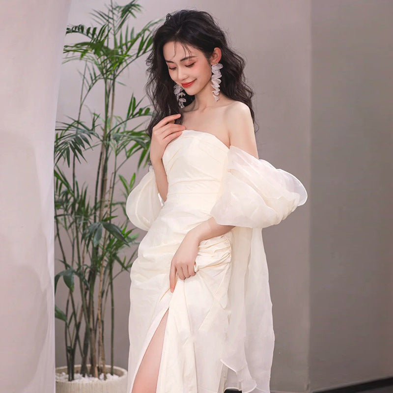 Simple long light wedding dress with strapless tube top design for the bride