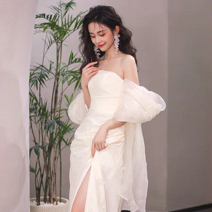 Simple long light wedding dress with strapless tube top design for the bride
