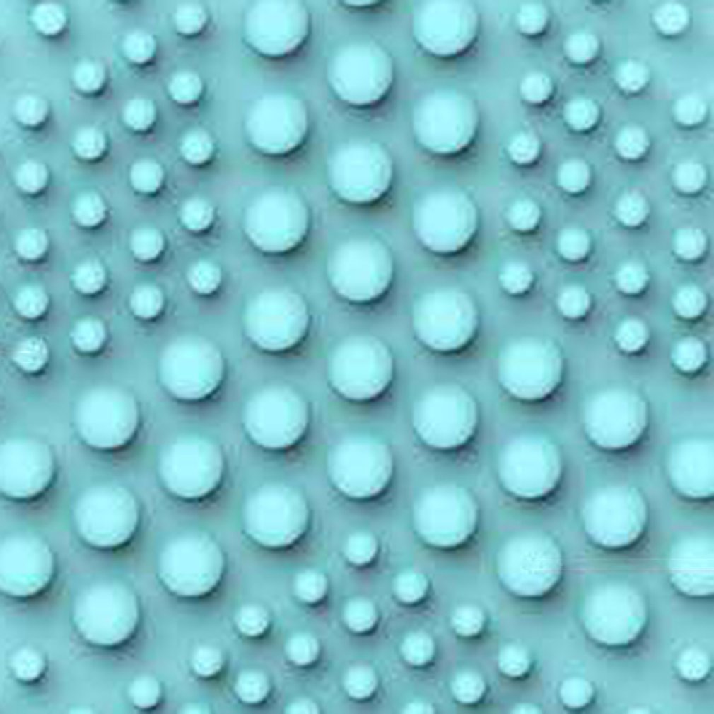 Three round 3D silicone cleansing instruments in a set, shown from above