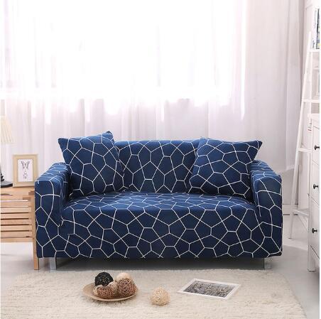 Elastic universal sofa cover in a neutral fabric, fitted over a standard sofa for a smooth, protective finish