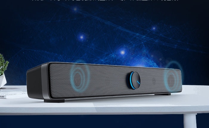 Long speaker notebook mobile phone desktop audio system with slim design and visible speaker grille