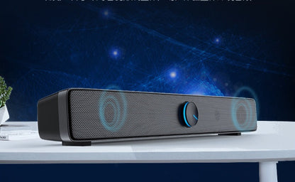 Long speaker notebook mobile phone desktop audio system with slim design and visible speaker grille