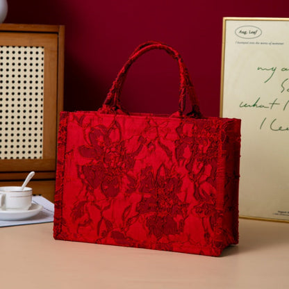 Relief-printed souvenir canvas gift bag with textured design and sturdy fabric handles