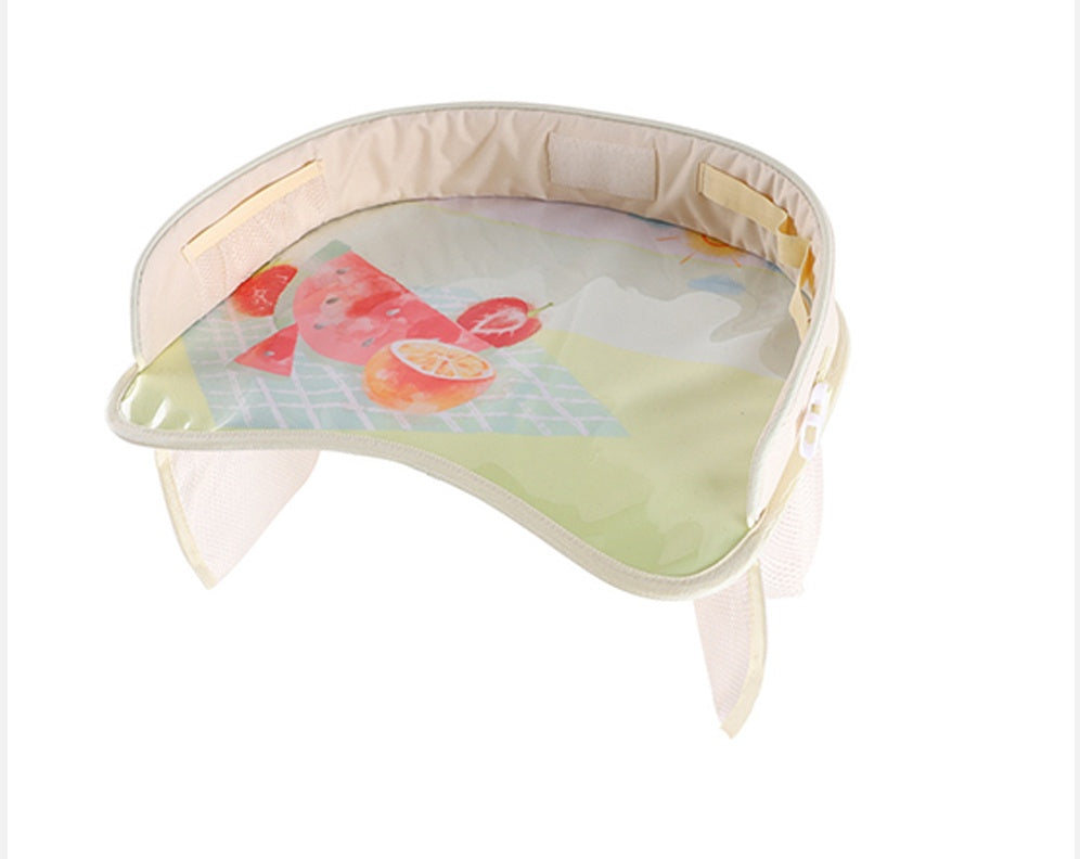 Baby car seat tray table with cup holder and activity surface, viewed from above