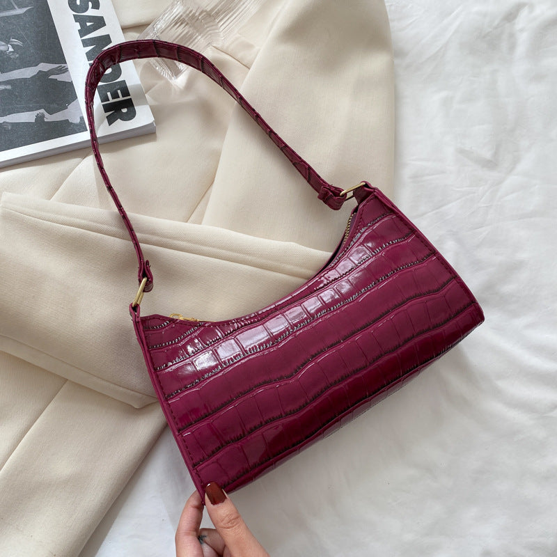 Women's small shoulder and underarm bag by BACKUPMYFILESNOW® in neutral color, featuring a simple design and compact size.