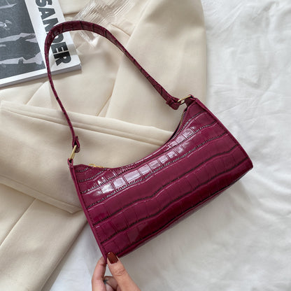 Women's small shoulder and underarm bag by BACKUPMYFILESNOW® in neutral color, featuring a simple design and compact size.