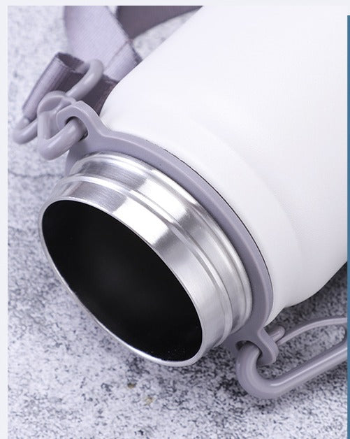 Insulated steel water flask by BACKUPMYFILESNOW® with large volume and a sleek, durable design for keeping drinks hot or cold.