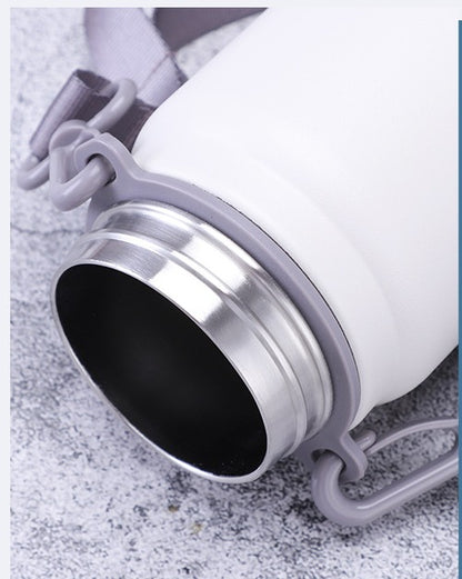 Insulated steel water flask by BACKUPMYFILESNOW® with large volume and a sleek, durable design for keeping drinks hot or cold.