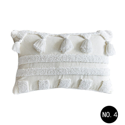 Nordic Moroccan tufted throw pillow with a simple textured pillowcase