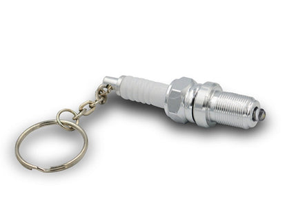 LED light spark plug keychain with detailed metallic design, compact automotive accessory