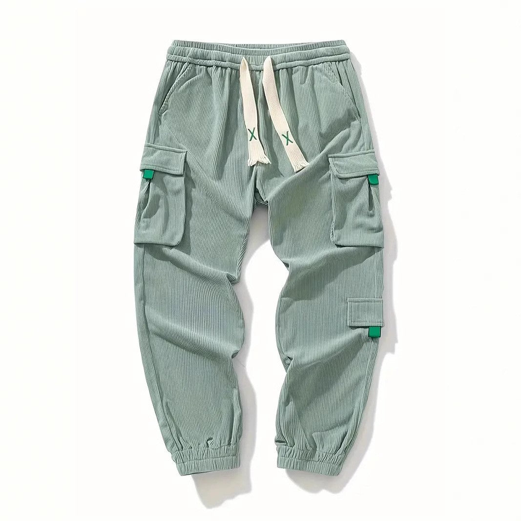 Corduroy plus size men's work pants with ankle-tightening trouser design in textured fabric