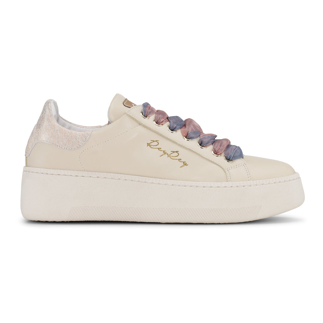 Beige ReyRey Special Edition sneakers with stylish design and comfortable fit, shown from a side view.