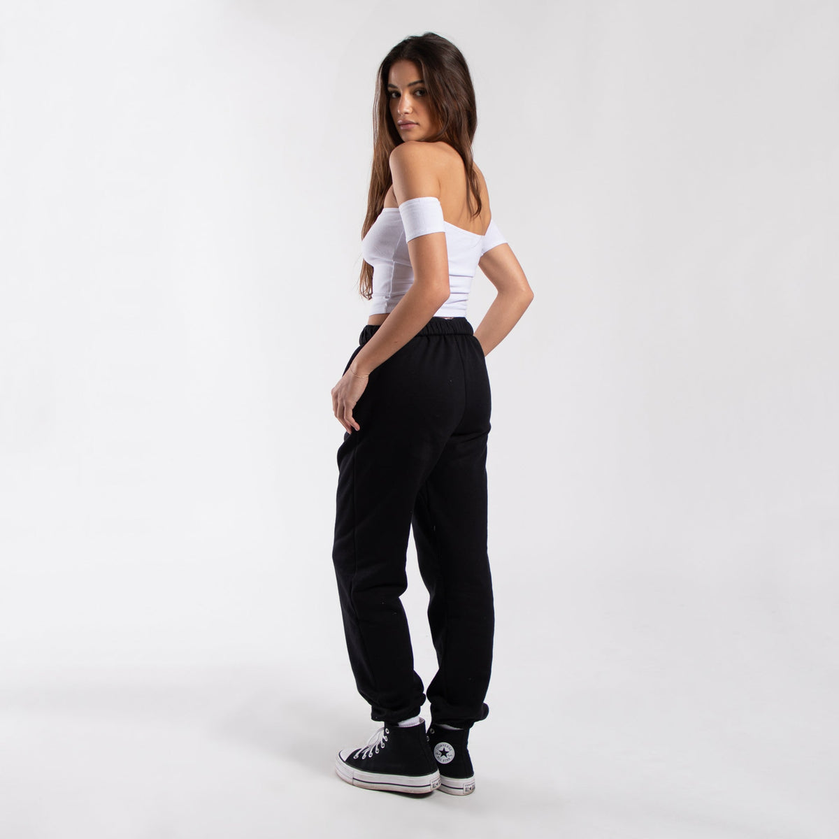 Women's off-shoulder cropped tee from POS Wholesale, stylish crop top with short sleeves and relaxed fit, casual summer fashion.
