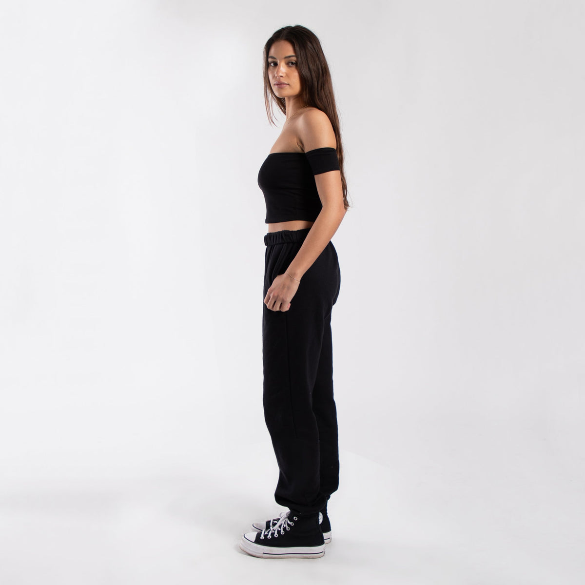 Women's off-shoulder cropped tee in soft fabric, stylish crop top by POS Wholesale, featuring a relaxed fit and trendy neckline.