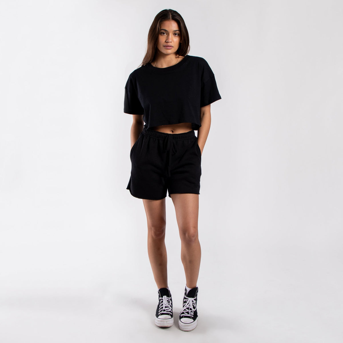 Women's loose cropped tee from POS Wholesale, casual crop top with relaxed fit and short sleeves, styled for everyday wear.