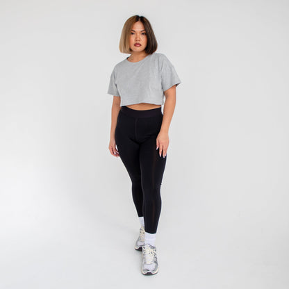 Women’s loose cropped tee from POS Wholesale, casual crop top in soft fabric, shown in a relaxed fit style.