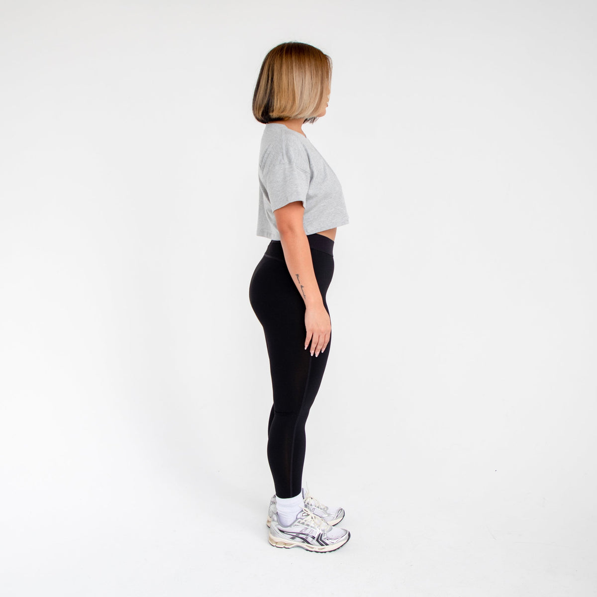 Women's loose cropped tee from POS Wholesale, casual crop top with a relaxed fit, displayed on a neutral background.